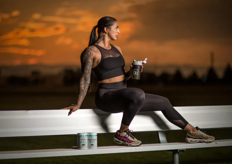 BCAA supplements beside a training bench