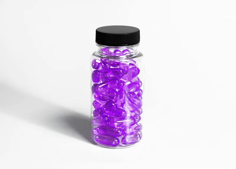 Biotin capsules alongside a healthy breakfast showing optimal timing
