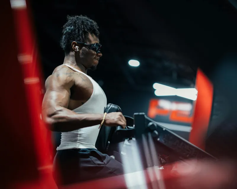 Pre-workout supplement collection with gym training accessories and powder containers
