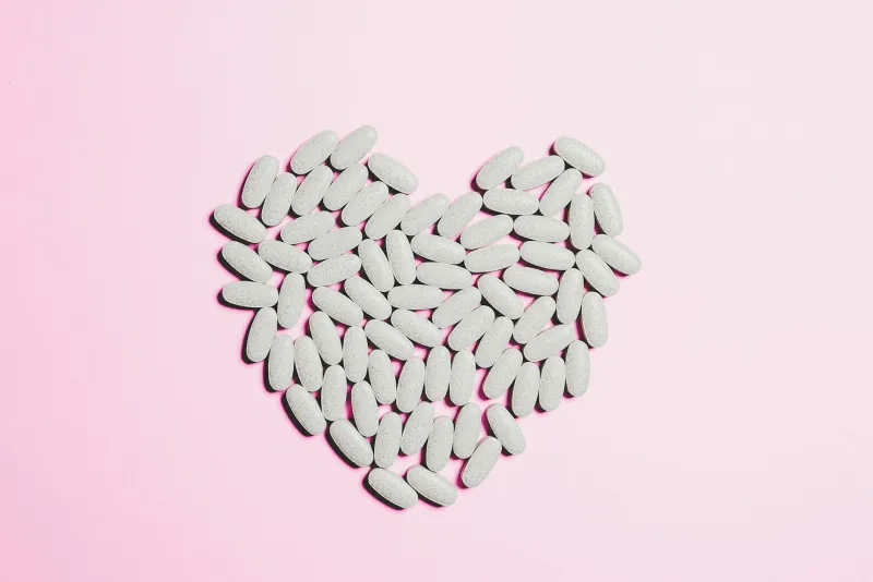 Inositol capsules and citrus fruits representing supplementation for PCOS and anxiety support