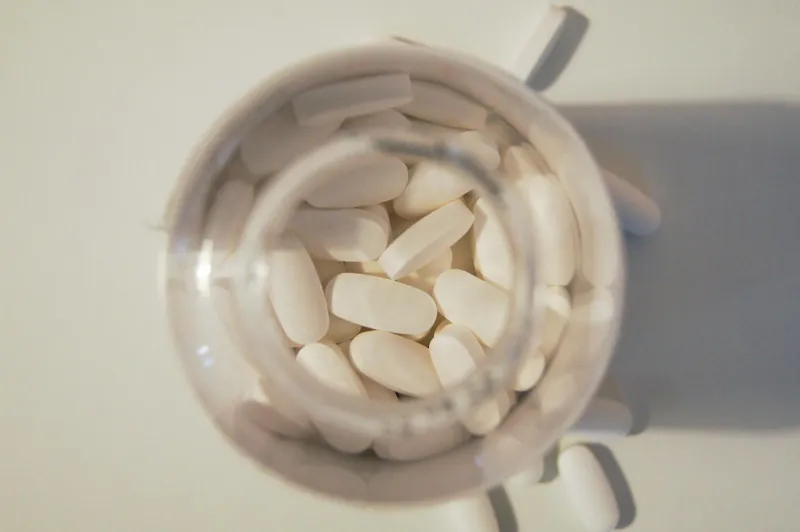 Person taking joint support supplements
