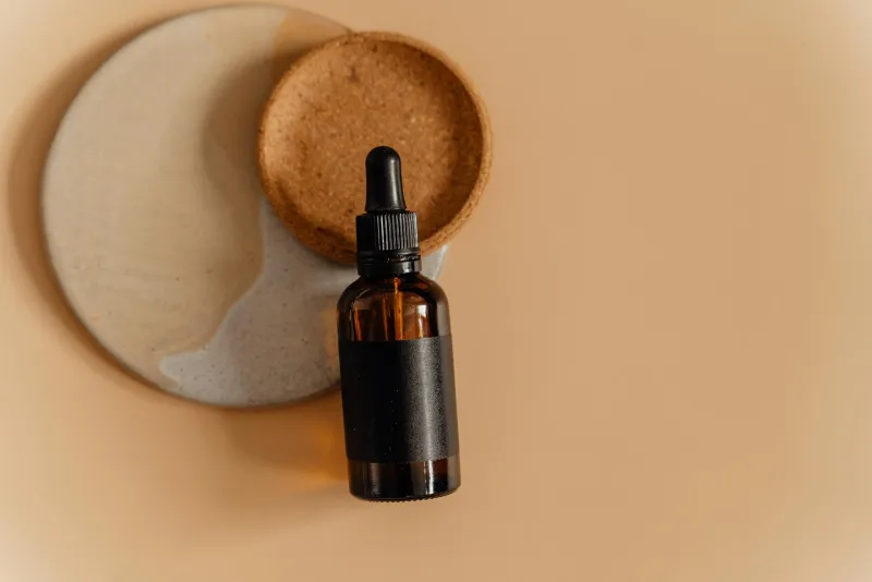 Woman taking thyroid health supplement
