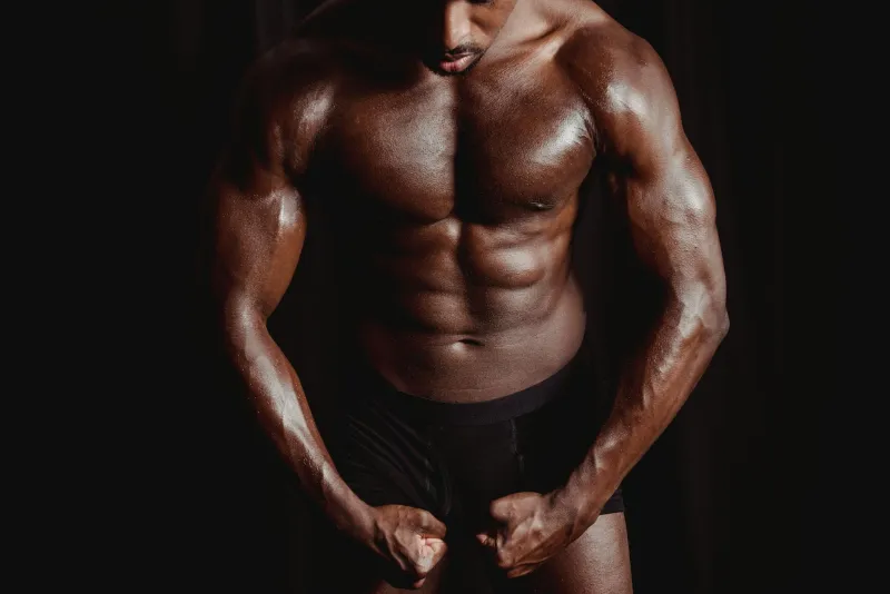 Active man in a gym — testosterone levels and physical performance