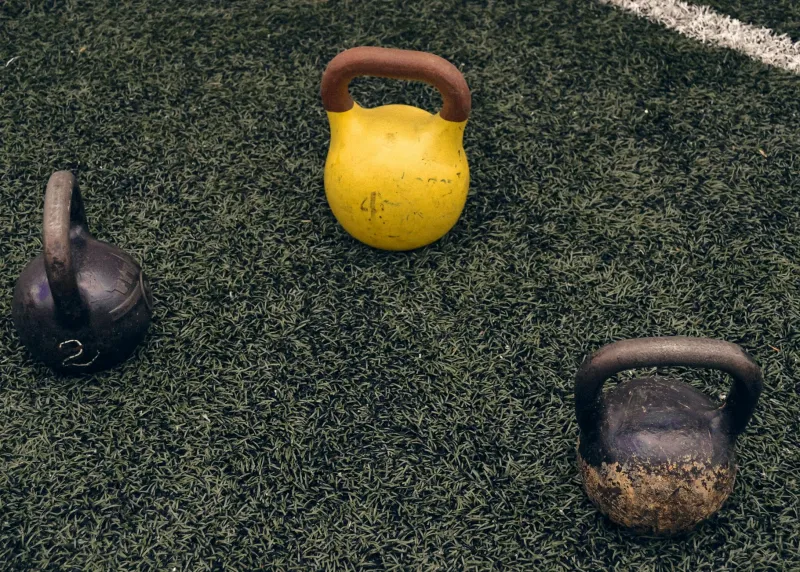 Athletic woman training in the gym with beta-alanine supplement