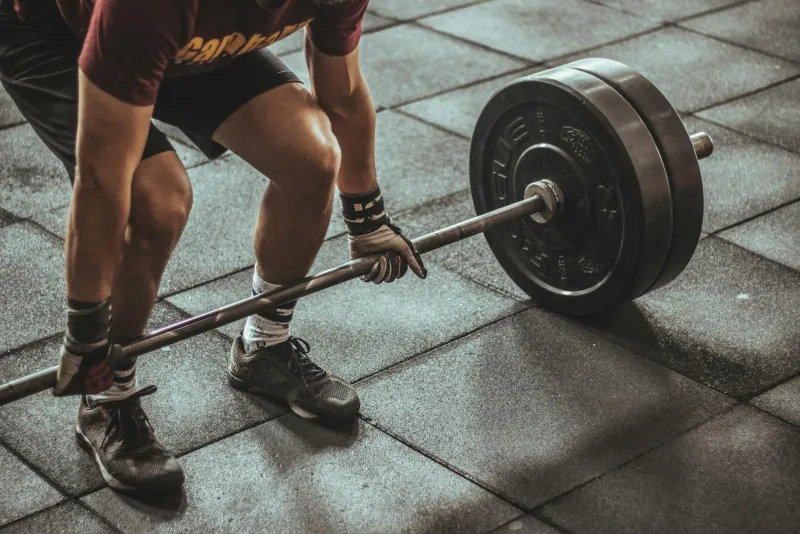 Creatine powder and gym training with safety interaction concept