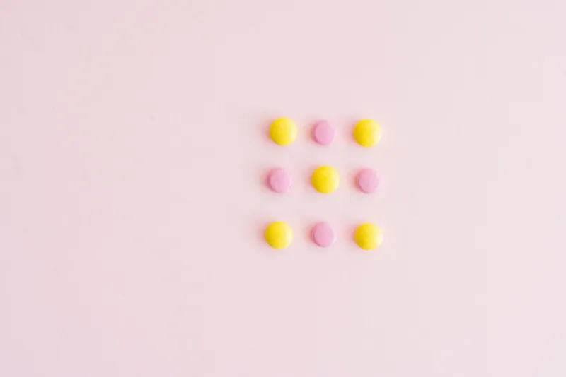 Biotin supplements and hair care products on a table